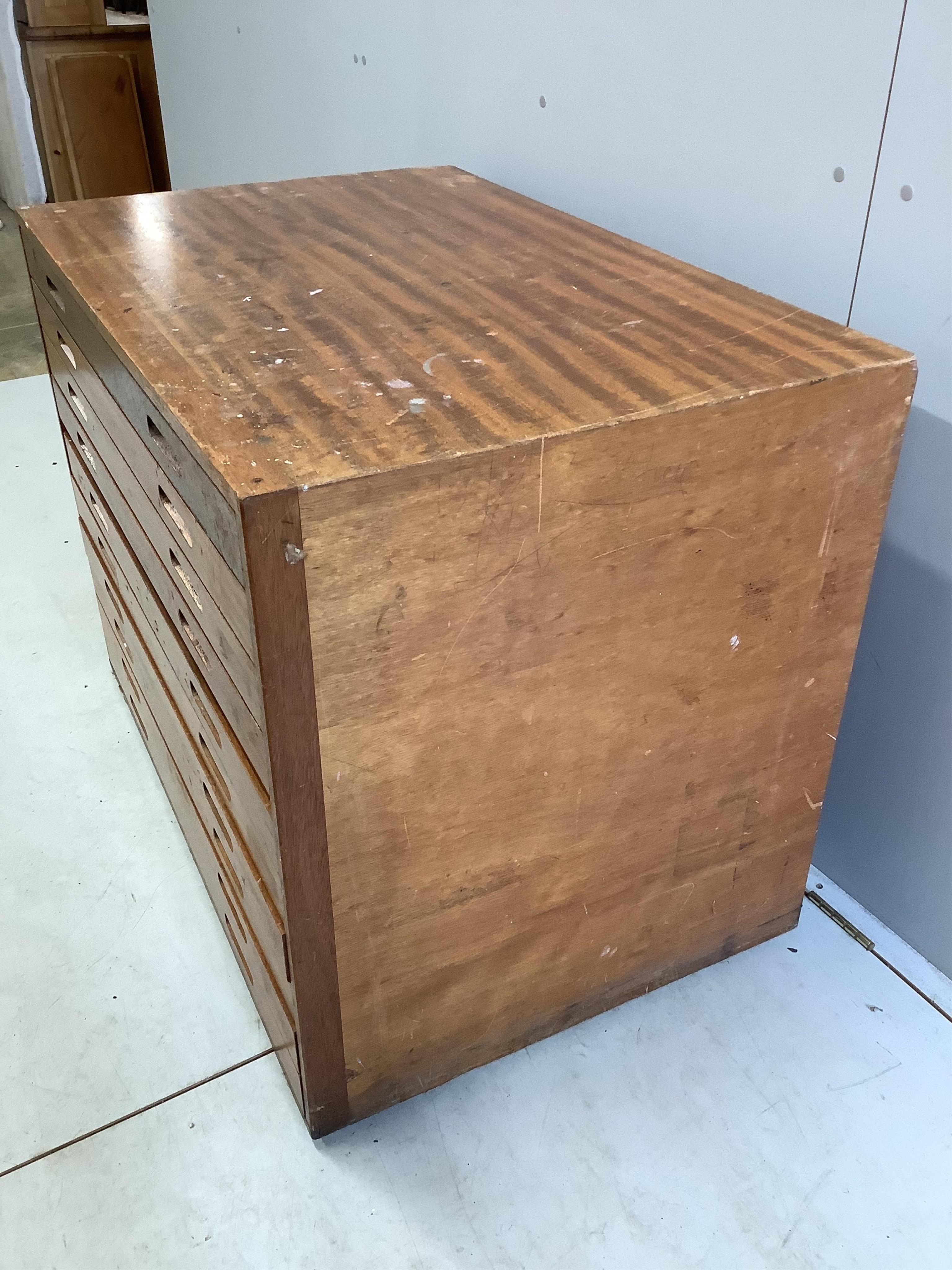 A mid century teak plan chest, width 101cm, depth 68cm, height 78cm. Condition - fair